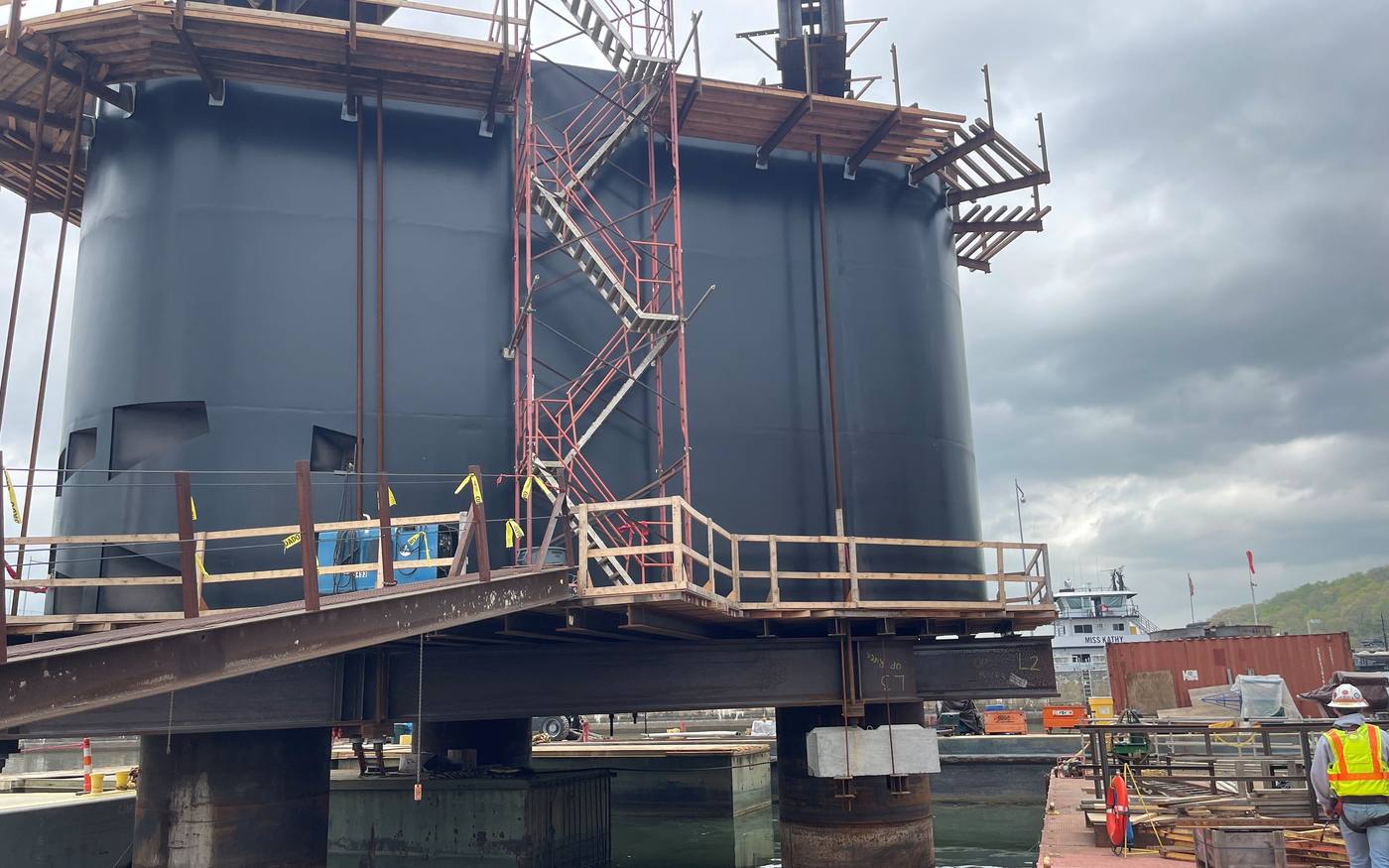 Field applied coating on a bridge pier under containment, Regal Industrial