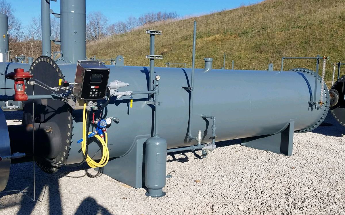 Field coated separator vessel and piping at a gas site