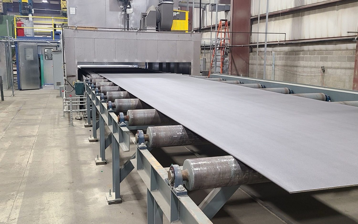 Steel plate on the automated plate preservation line at Regal Industrial Donora