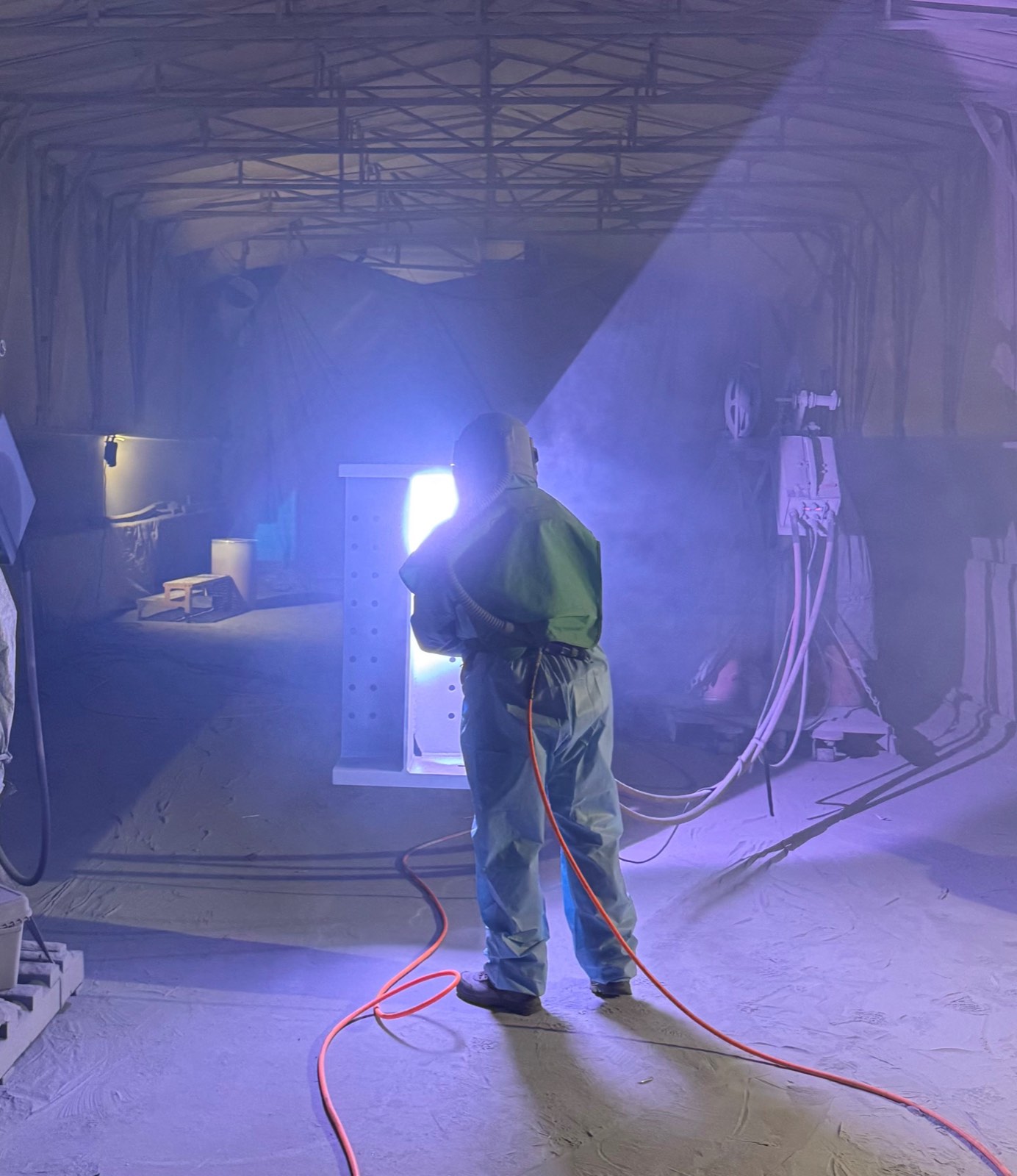 Abrasive blasting of large structural steel components
