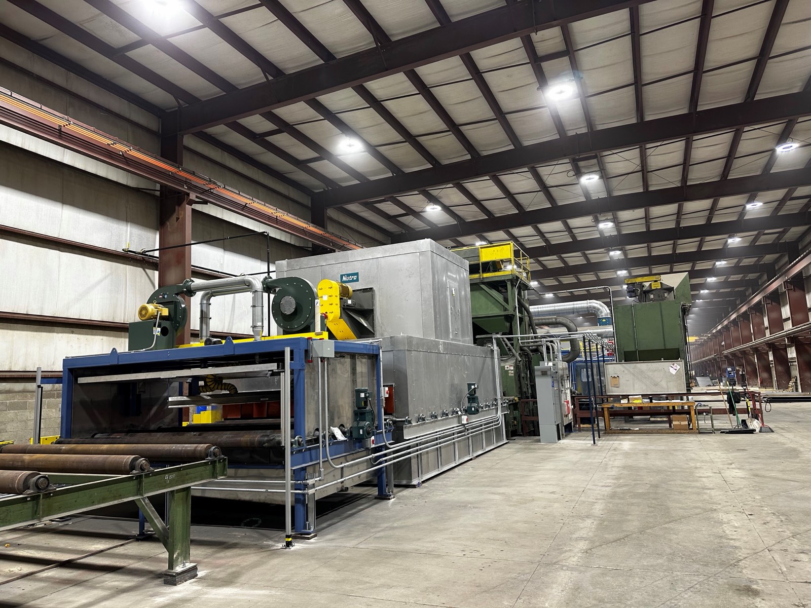 Automated blast and prime plate line equipment in the Donora facility